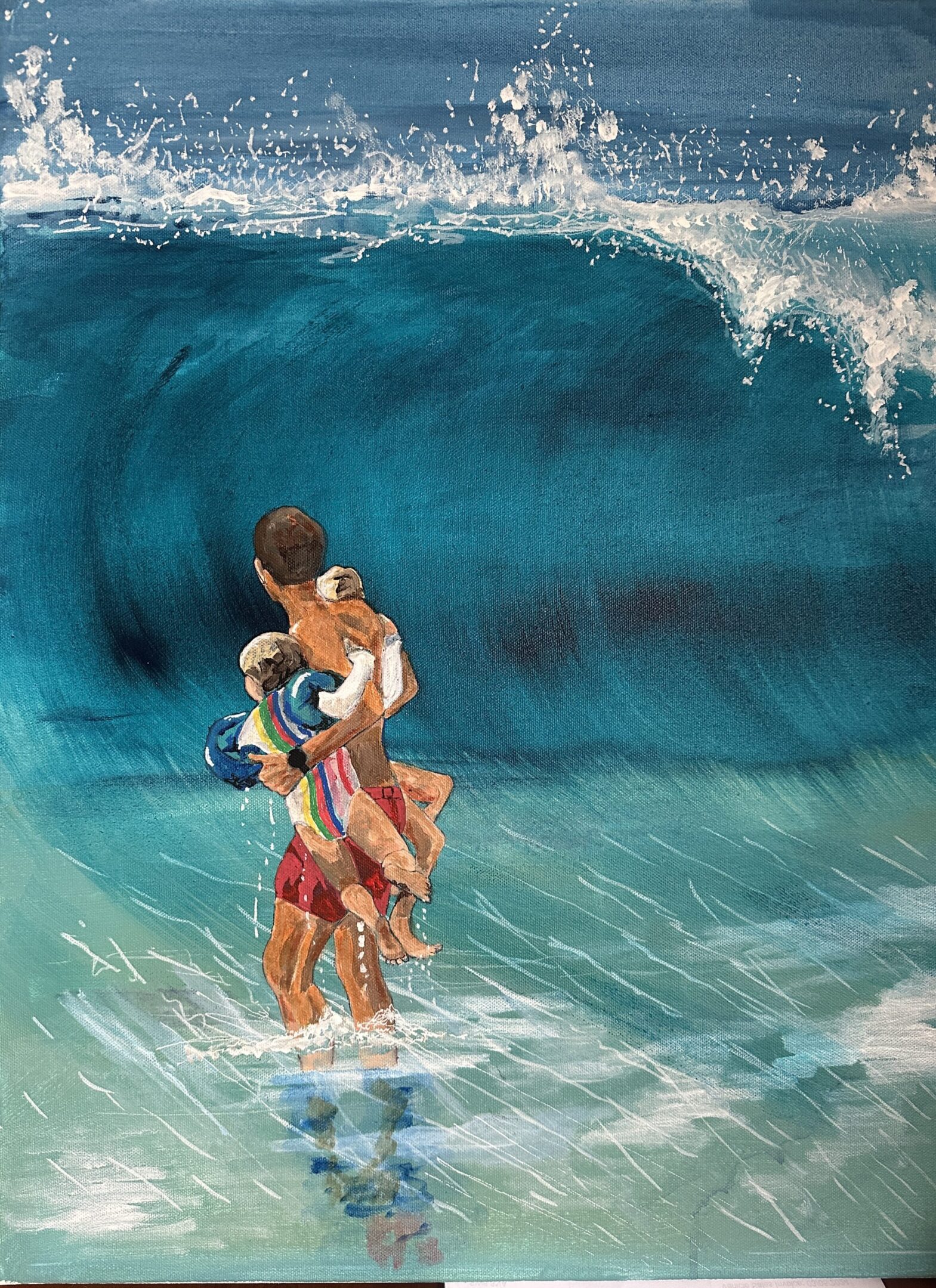 A couple stands together in shallow ocean waves under a huge curling wave.