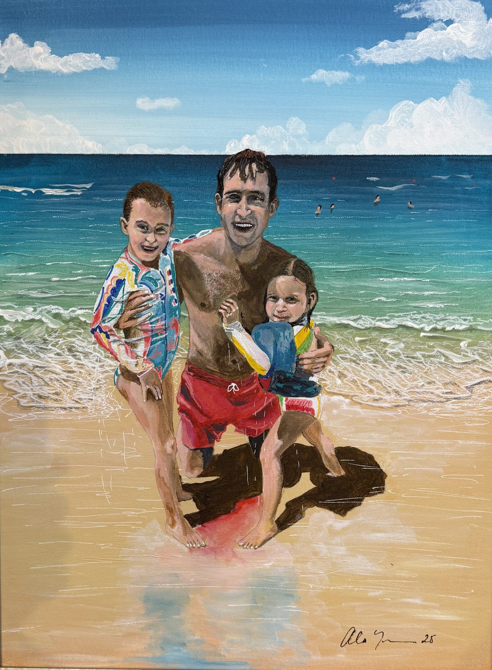 A man joyfully playing with two children at the beach.